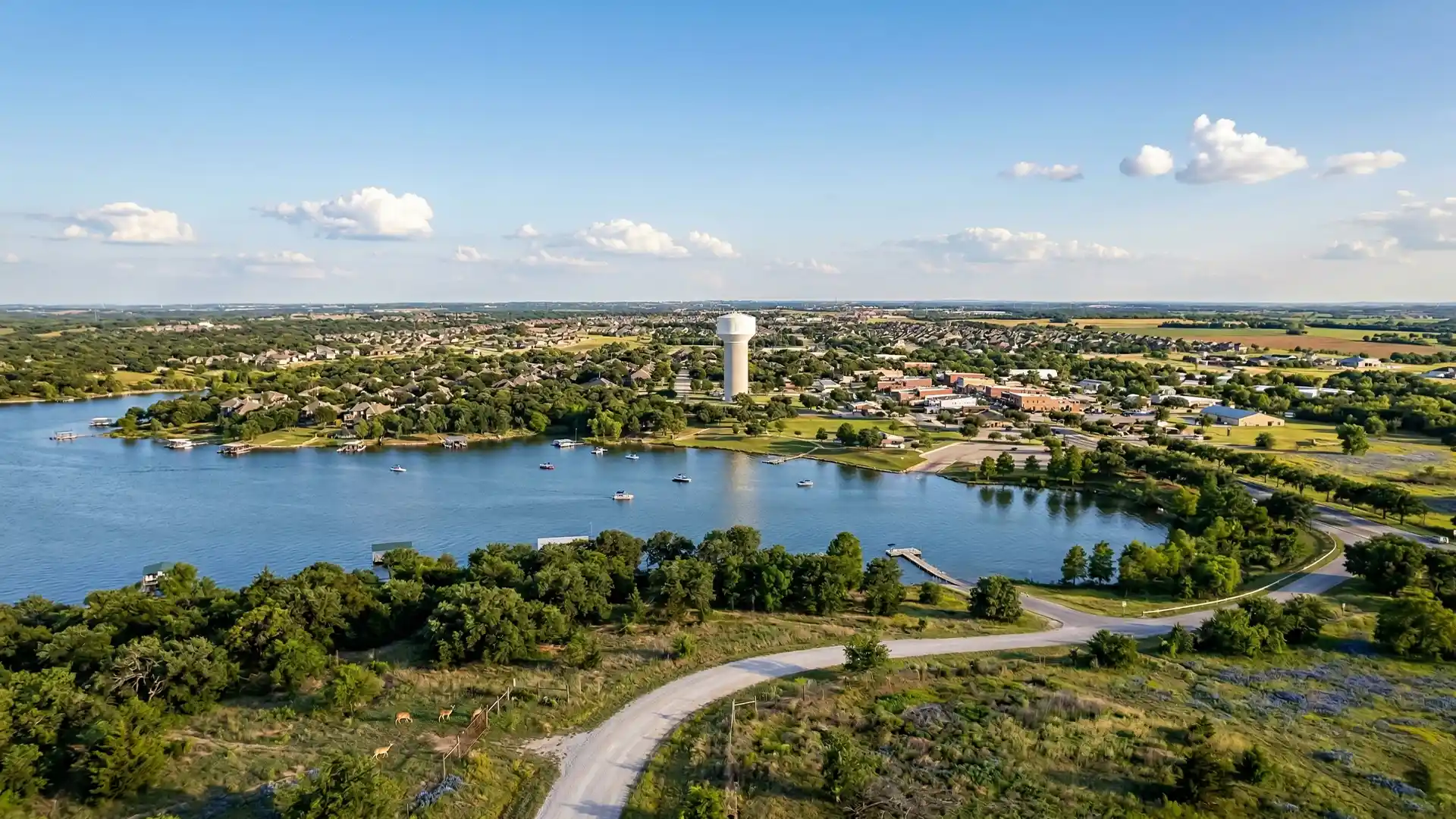 Aerial view of Princeton Texas with lake, boats, and surrounding neighborhoods